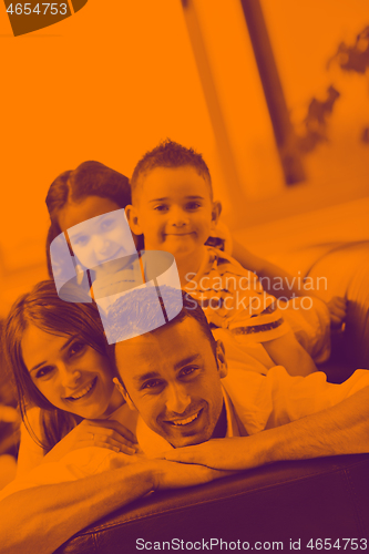 Image of young family at home