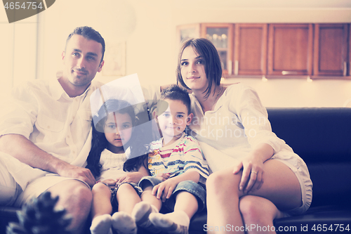 Image of young family at home