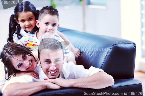 Image of young family at home