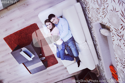 Image of couple relax at home on sofacouple relaxing at home