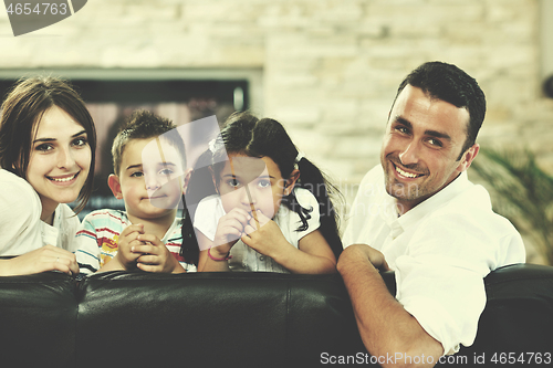 Image of young family at home