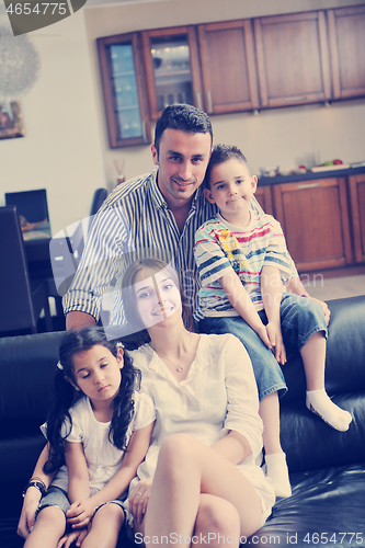 Image of young family at home