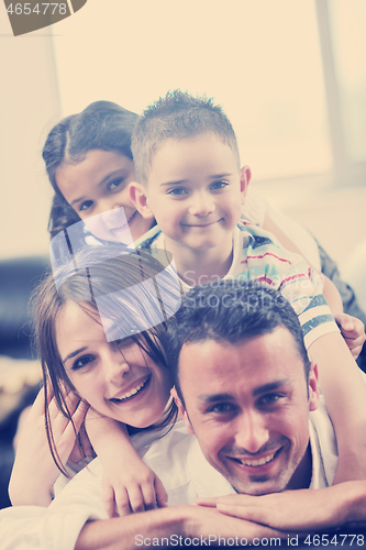 Image of young family at home