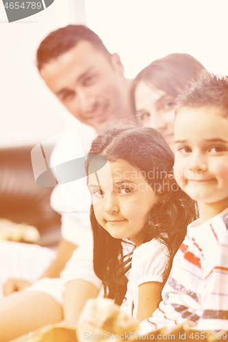 Image of young family at home