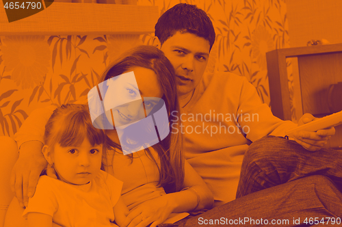 Image of happy young family at home