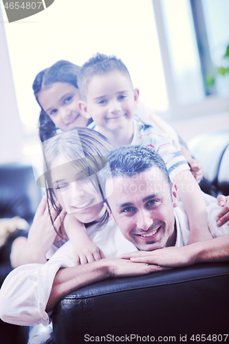 Image of young family at home