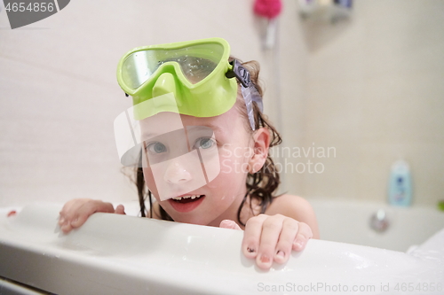 Image of little girl with snorkel goggles