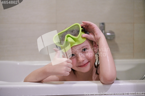 Image of little girl with snorkel goggles