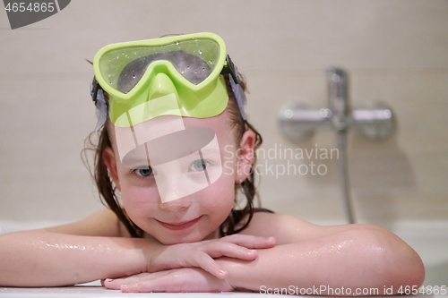 Image of little girl with snorkel goggles