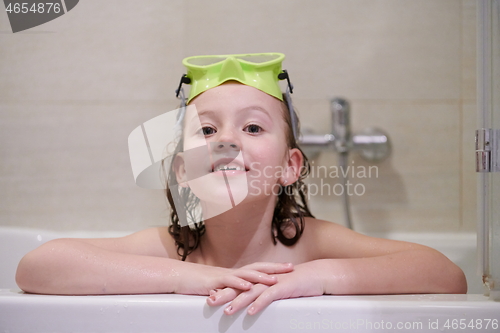 Image of little girl with snorkel goggles