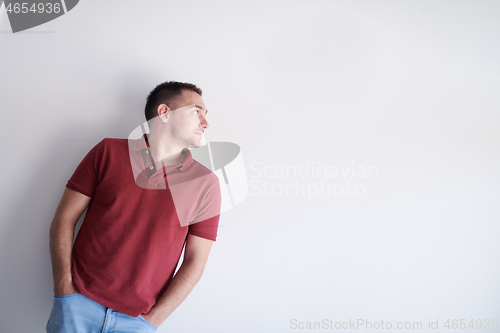 Image of portrait of casual startup businessman wearing a red T-shirt