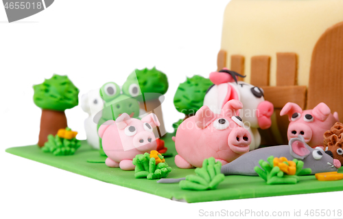 Image of birthday cake with farm marzipan animals