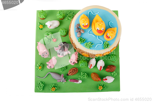 Image of birthday cake with farm marzipan animals