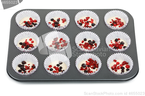 Image of raw homemade Muffin isolated on white background