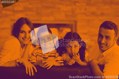 Image of young family at home