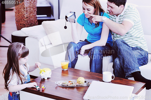 Image of happy family special moments on video