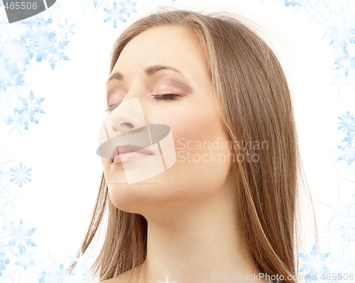 Image of beautiful woman with closed eyes