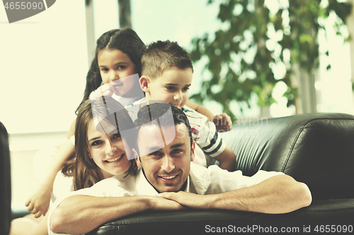 Image of young family at home