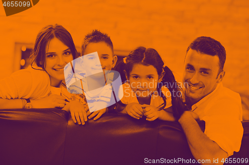 Image of young family at home