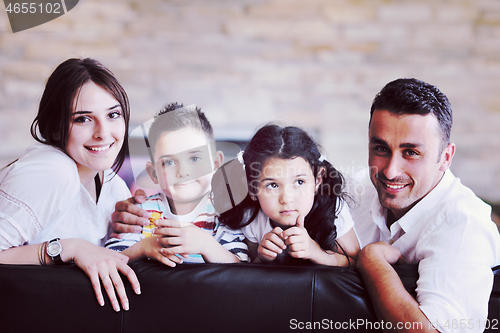 Image of young family at home