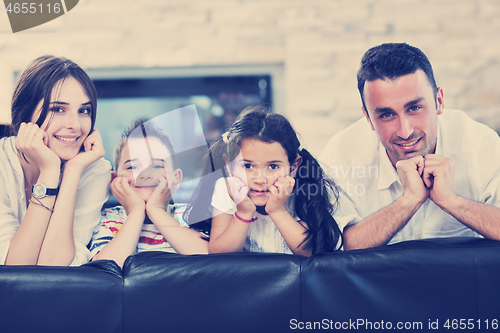 Image of young family at home