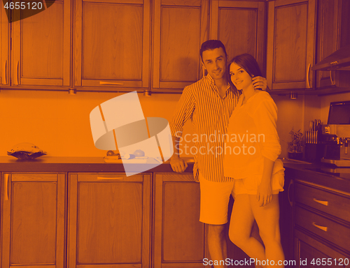 Image of happy young couple have fun in modern kitchen