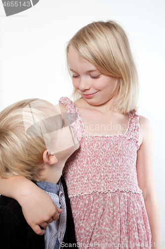 Image of Portrait of a brother and sister in studio