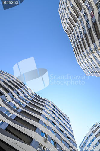 Image of Wide angle shot of new apartments buildings exterior