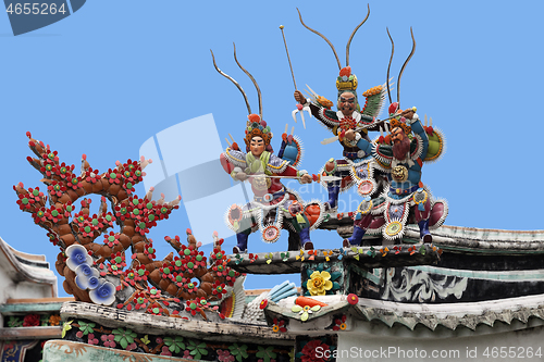 Image of Warriors on a temple roof