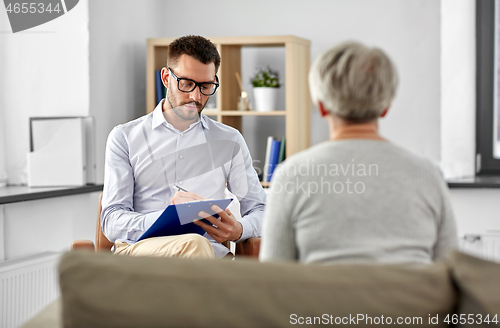 Image of senior woman patient and psychologist