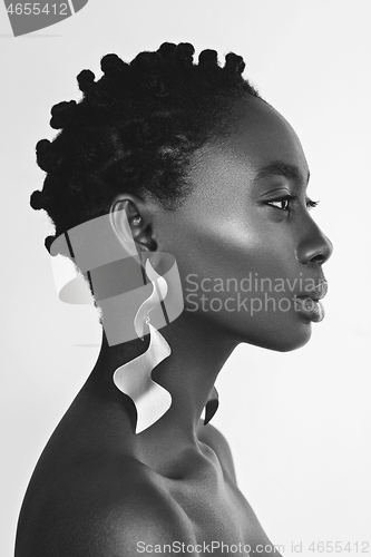 Image of Beautiful black girl with big earrings