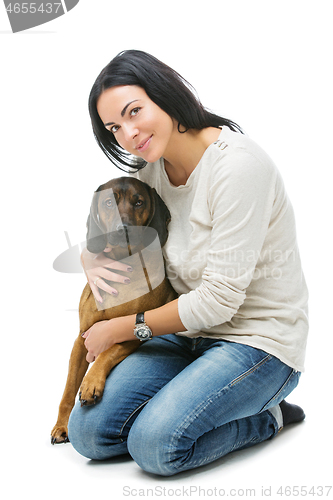 Image of Beautiful girl with dog