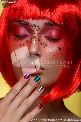 Image of Beautiful girl in red wig