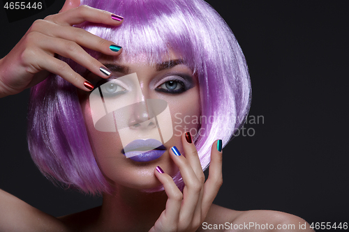 Image of Beautiful girl in purple wig