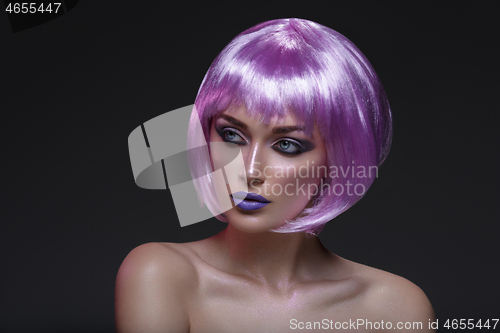 Image of Beautiful girl in purple wig