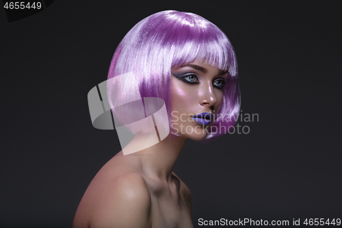 Image of Beautiful girl in purple wig