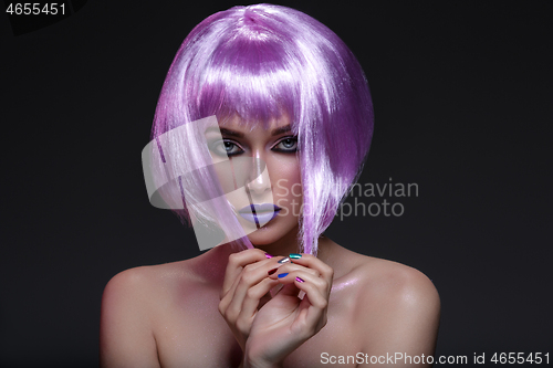 Image of Beautiful girl in purple wig