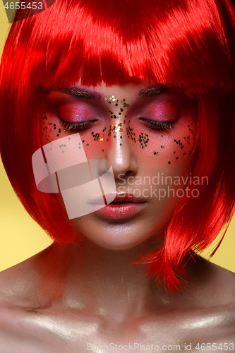 Image of Beautiful girl in red wig