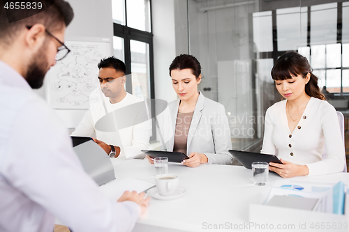 Image of recruiters having job interview with employee