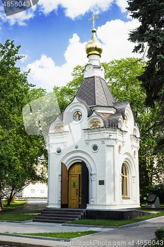 Image of Small orthodox chapel in summer park. Russia