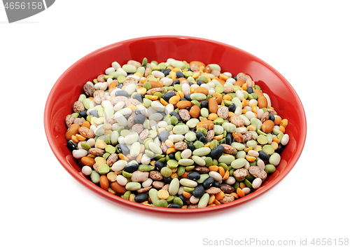 Image of Mixed dried beans and peas in a red bowl