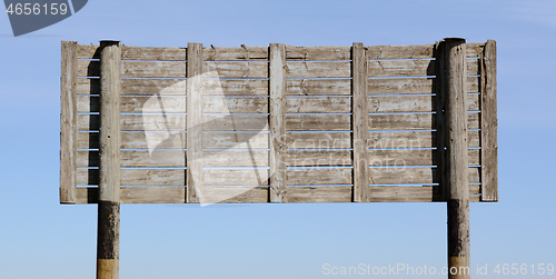 Image of Weathered wooden signboard