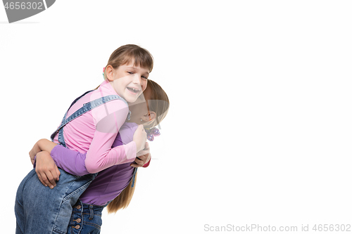 Image of Girl happily hugged her beloved a girlfriend
