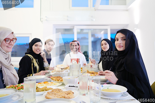 Image of muslim family having a Ramadan feast