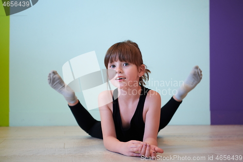 Image of girl having fun and dancing wearing mothers jewelry