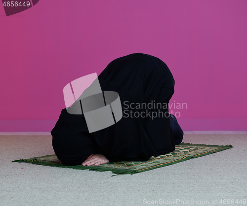 Image of Muslim woman namaz praying Allah