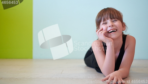 Image of girl having fun and dancing wearing mothers jewelry