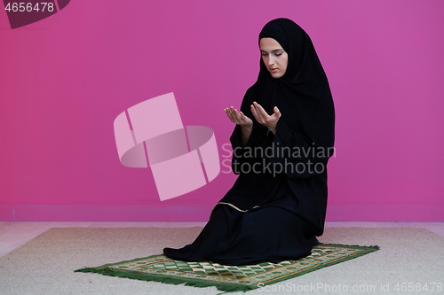 Image of Muslim woman namaz praying Allah