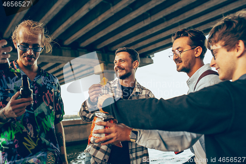 Image of Group of friends celebrating, resting, having fun and party in summer day