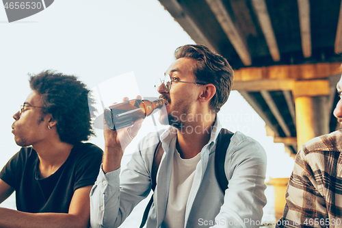 Image of Group of friends celebrating, resting, having fun and party in summer day